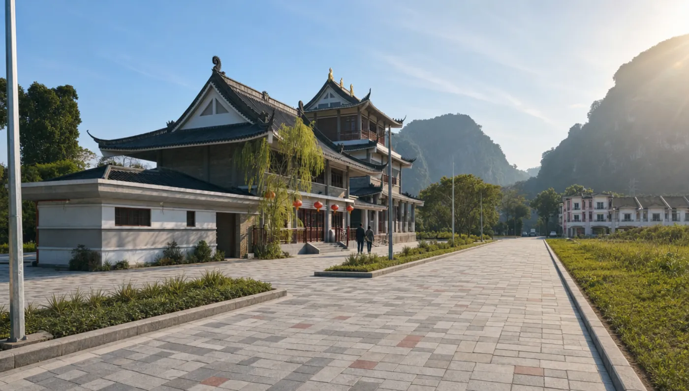The temple at golden hour, the tiered Block A behind the lower block, against the Tambun limestone hills.